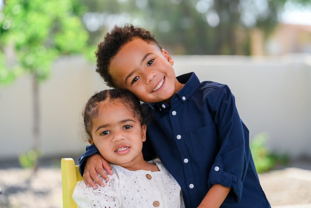 two kids smiling