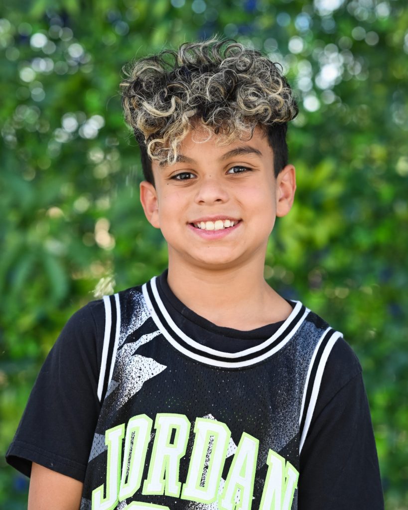 A boy with curly hair