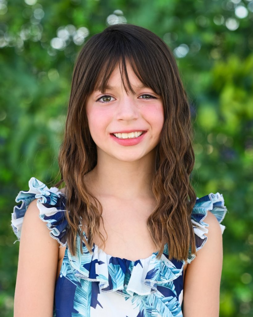 A girl in blue dress