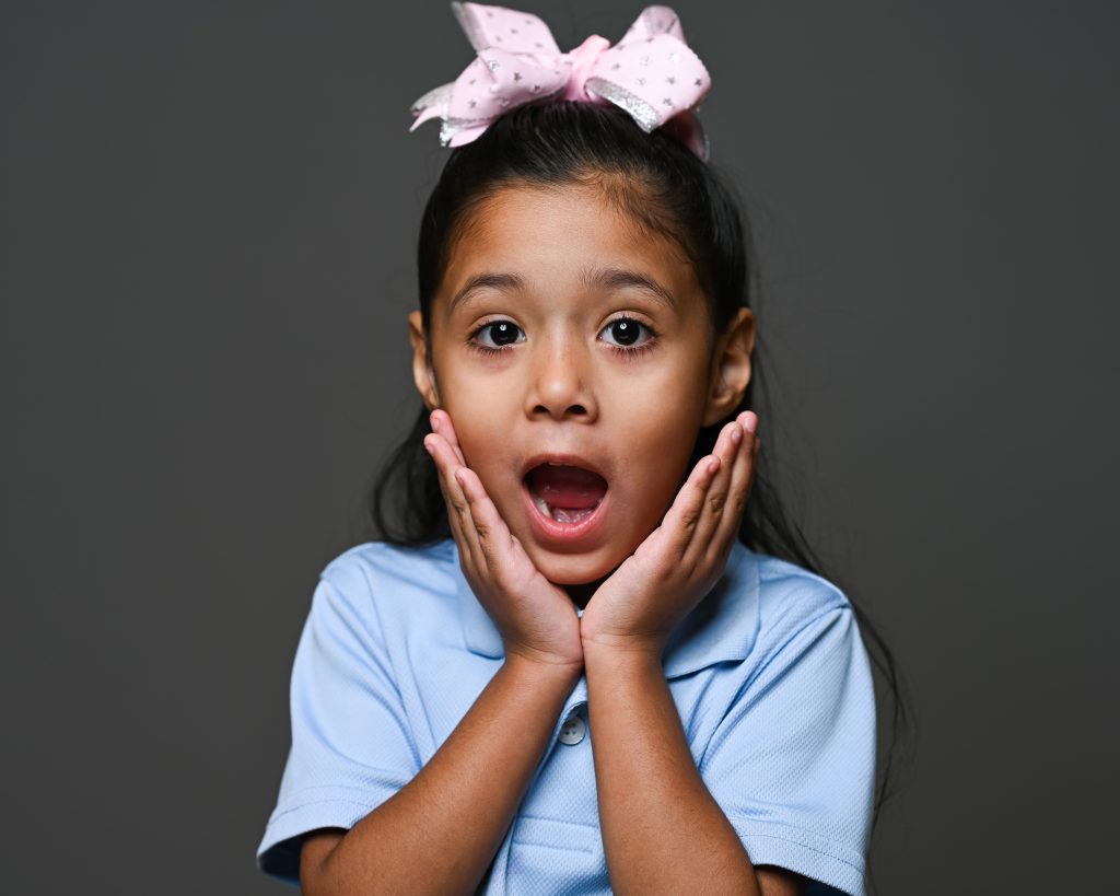 a girl posing like in a shock