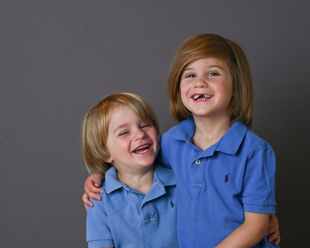 two kids in blue shirt
