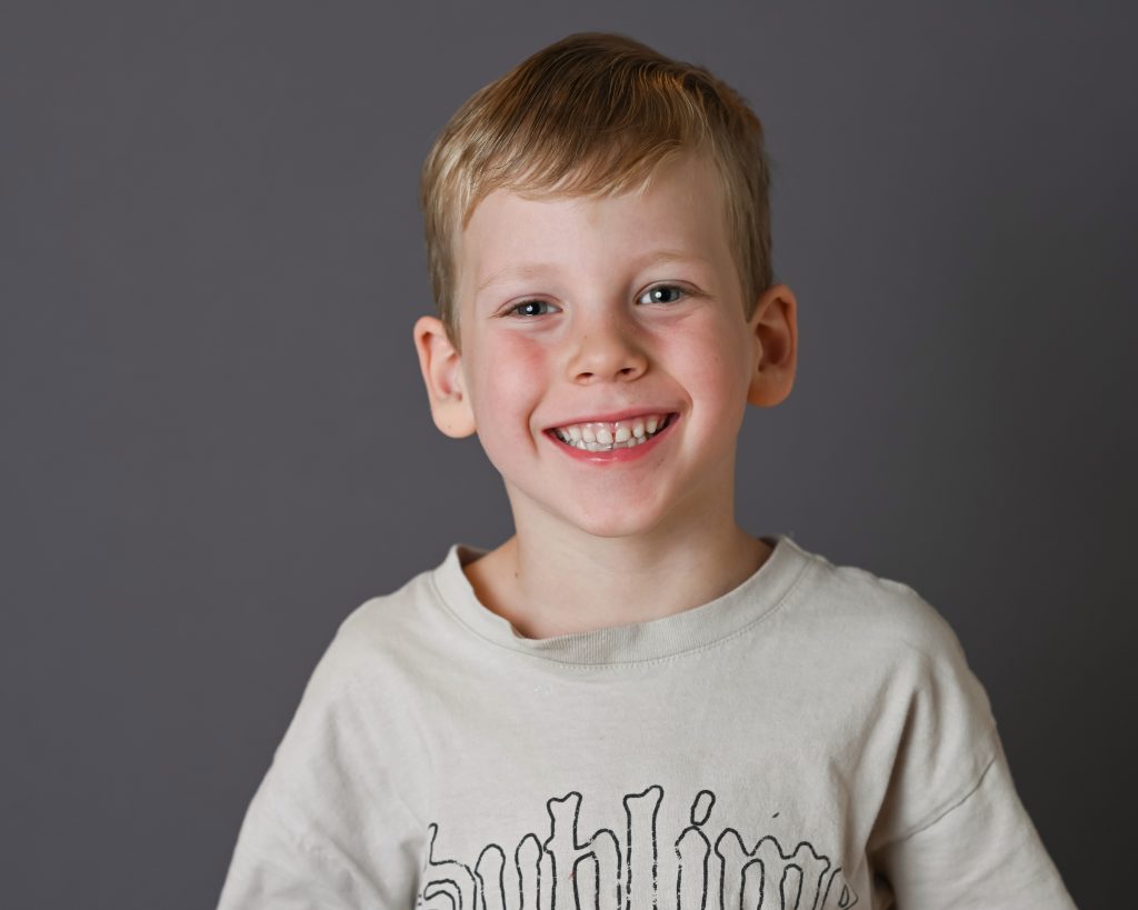 a kid smiling