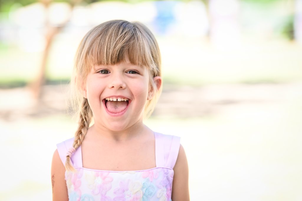 a kid smiling