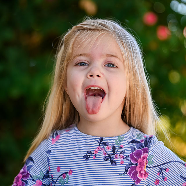 a kid posing on the camera